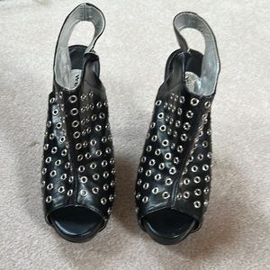 Black heels with metal holes